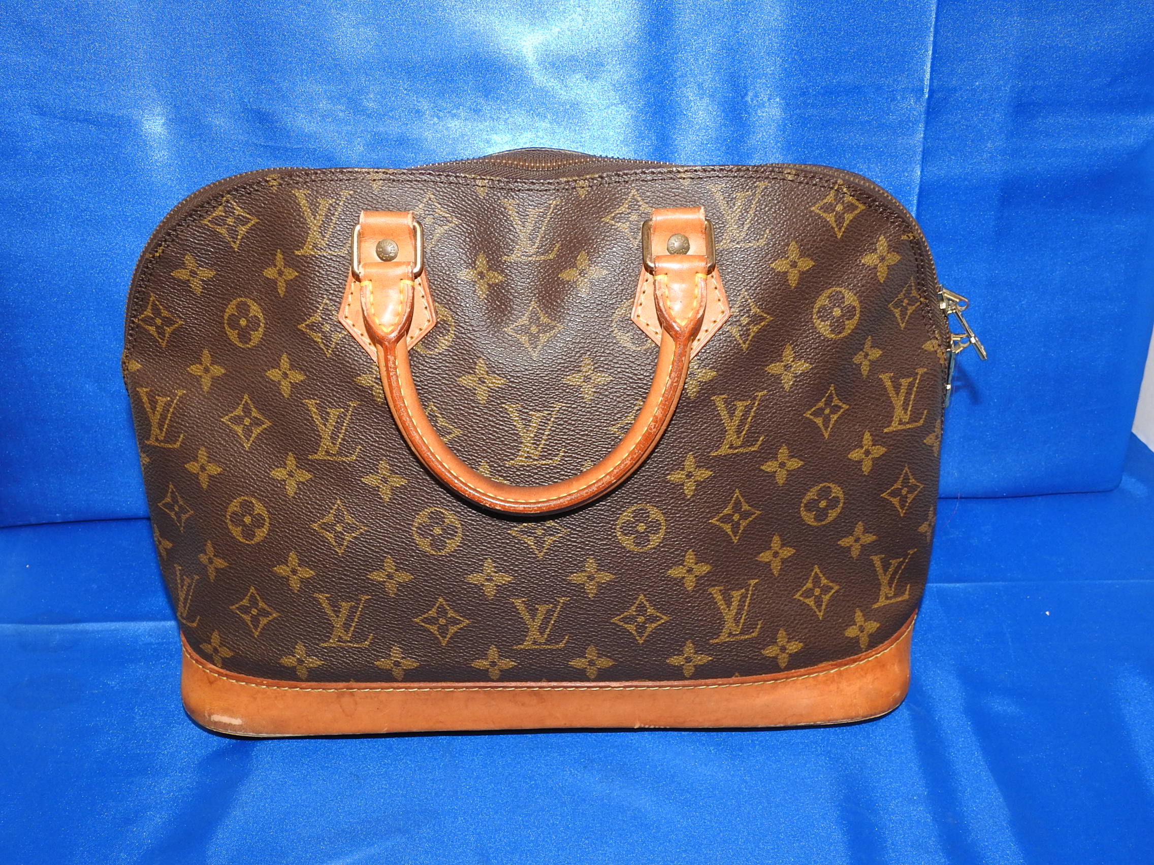 Louis Vuitton Purses – Fiesta Texas Pawn of Arlington